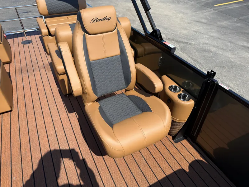 Slide: The Image of Luxurious seating on 2026 Bentley Pontoons Elite 253 QSB with cup holders and premium upholstery. - 19