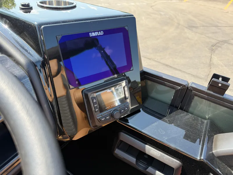 Slide: The Image of Dashboard of 2026 Bentley Pontoons Elite 253 QSB with Simrad display. - 24