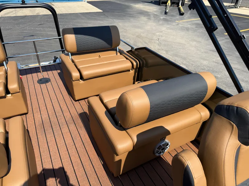 Slide: The Image of Luxurious seating on 2026 Bentley Pontoons Elite 253 QSB with tan and black upholstery. - 29
