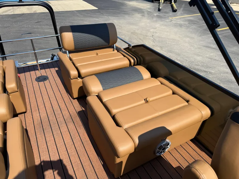 Slide: The Image of Luxurious seating on 2026 Bentley Pontoons Elite 253 QSB with tan upholstery and sleek design. - 30