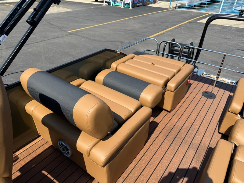 Slide: The Image of 2026 Bentley Pontoons Elite 253 QSB interior with luxurious tan seating and sleek design. - 31