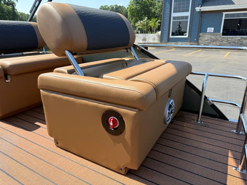 Slide: The Image of 2026 Bentley Pontoons Elite 253 QSB, luxurious tan seating, outdoor setting. - 34