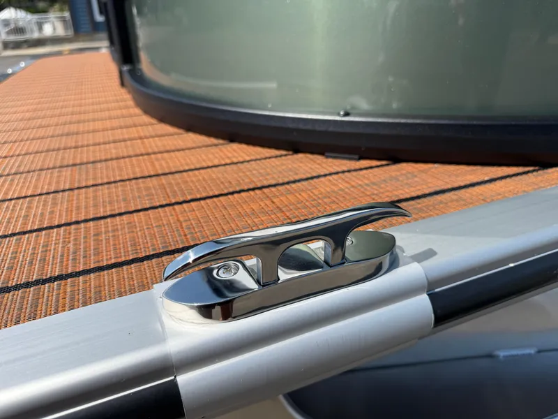 Slide: The Image of 2026 Bentley Pontoons Elite 253 QSB with sleek chrome cleat on deck. - 39