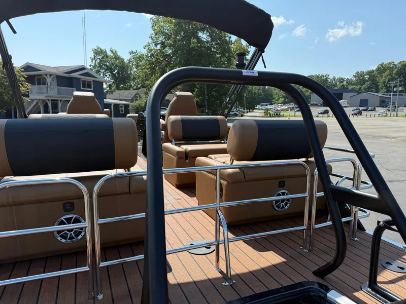 Slide: The Image of 2026 Bentley Pontoons Elite 253 QSB interior with luxurious seating and sleek design. - 6
