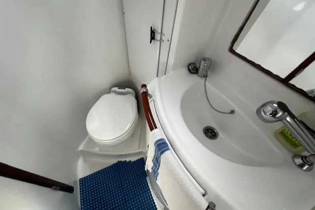 Slide: The Image of Bathroom interior of 2006 Beneteau 343 Sloop with toilet and sink. - 20