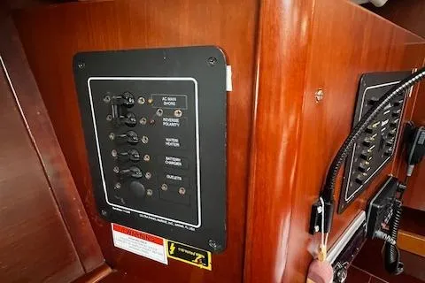 Slide: The Image of Electrical panel on a 2006 Beneteau 343 Sloop sailboat interior. - 26
