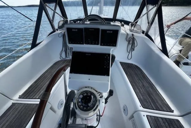 Slide: The Image of Cockpit of 2006 Beneteau 343 Sloop with navigation instruments and compass. - 44