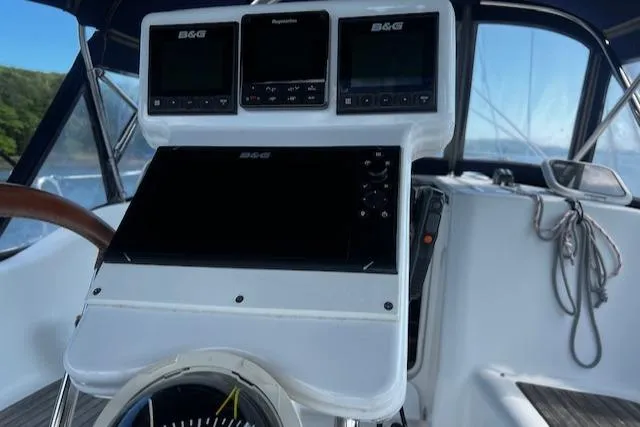 Slide: The Image of Cockpit of 2006 Beneteau 343 Sloop with navigation instruments and steering wheel. - 47