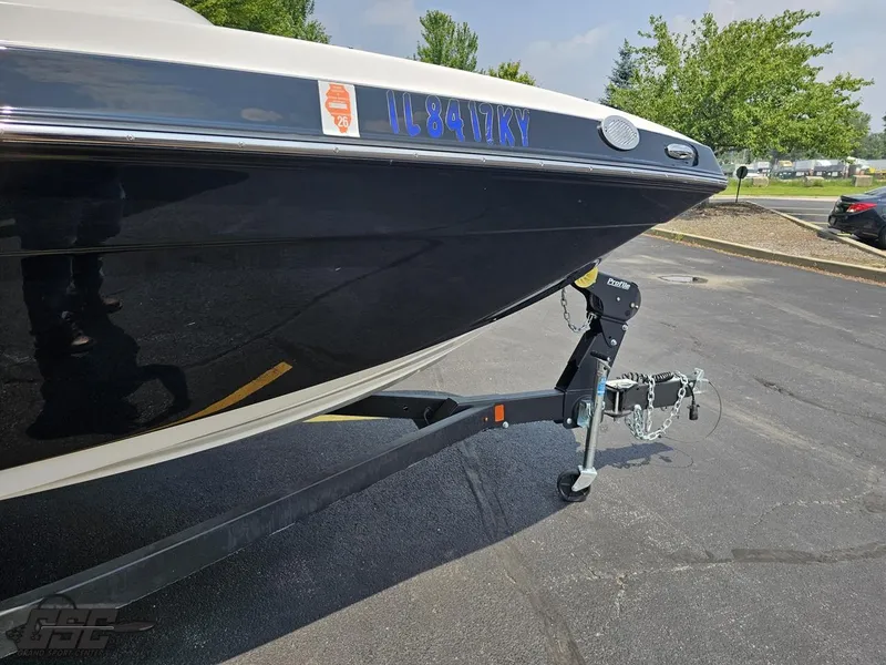 Slide: The Image of 2019 Yamaha AR195 boat on trailer in parking lot. - 11