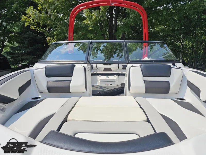 Slide: The Image of 2019 Yamaha AR195 boat interior with sleek seating and red wakeboard tower. - 16