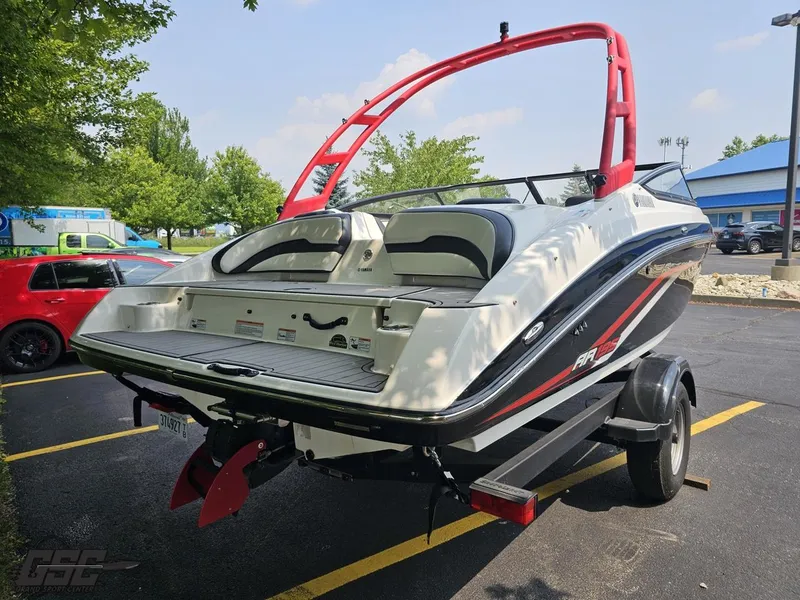 Slide: The Image of 2019 Yamaha AR195 boat on trailer, featuring sleek design and vibrant red accents. - 33