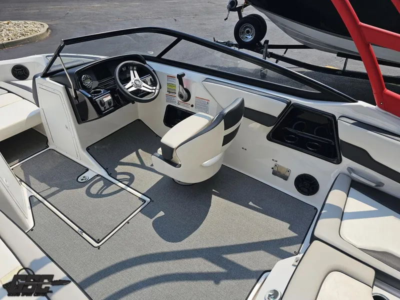 Slide: The Image of 2019 Yamaha AR195 boat interior with steering wheel and seating. - 44