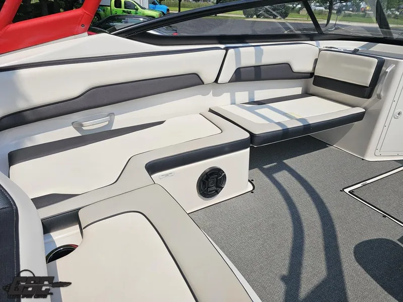 Slide: The Image of 2019 Yamaha AR195 boat interior with cushioned seating and speaker. - 45
