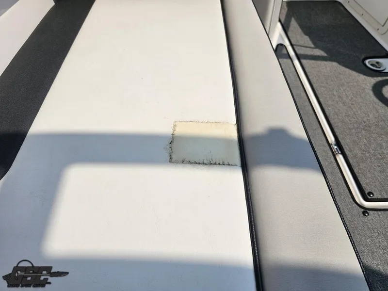 Slide: The Image of 2019 Yamaha AR195 boat seat with visible wear and tear on upholstery. - 48
