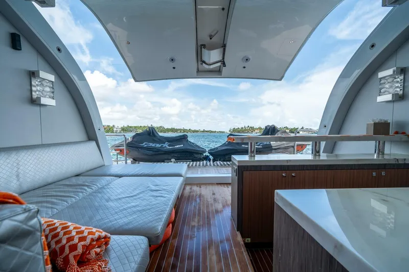 Slide: The Image of Luxurious 2020 Hargrave C92 yacht interior with ocean view and jet skis. - 10