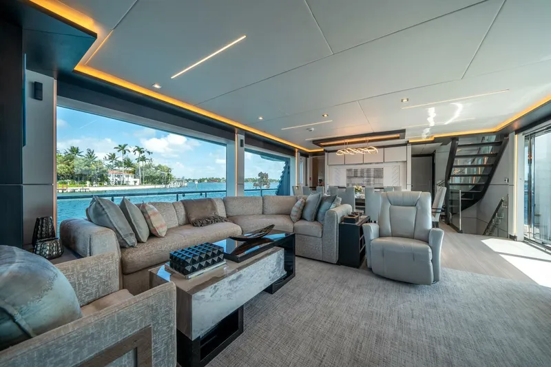 Slide: The Image of Luxurious interior of 2020 Hargrave C92 yacht with modern furnishings and scenic ocean view. - 17