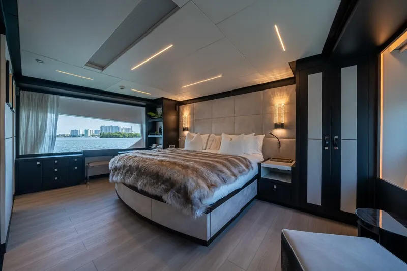 Slide: The Image of Luxurious bedroom interior on 2020 Hargrave C92 yacht with waterfront view. - 24