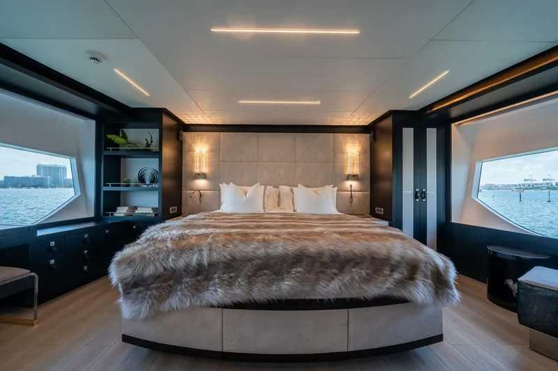Slide: The Image of Luxurious bedroom interior on 2020 Hargrave C92 yacht with waterfront views and elegant decor. - 25