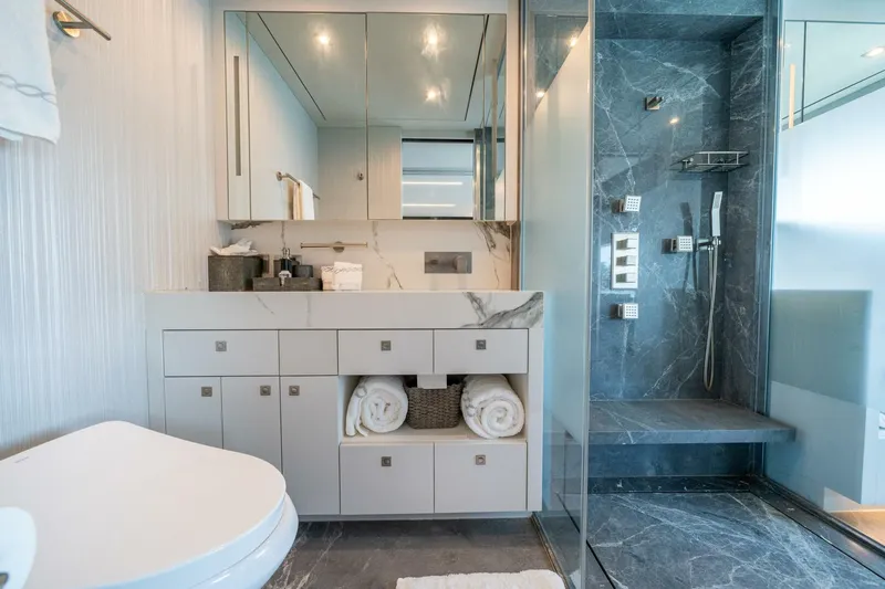 Slide: The Image of Luxurious bathroom in 2020 Hargrave C92 yacht with marble shower and modern vanity. - 28