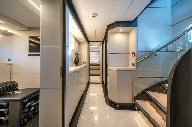 Slide: The Image of Luxurious interior of 2020 Hargrave C92 yacht with modern design and elegant staircase. - 33