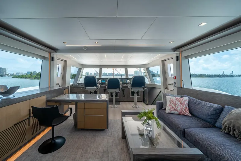 Slide: The Image of Luxurious interior of 2020 Hargrave C92 yacht with modern furnishings and panoramic windows. - 34