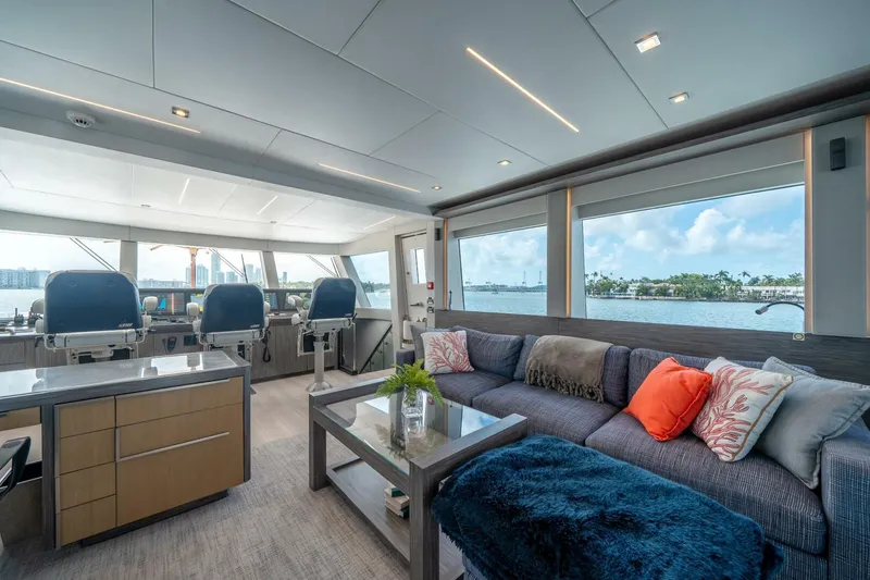 Slide: The Image of Luxurious interior of 2020 Hargrave C92 yacht with modern seating and scenic ocean views. - 35