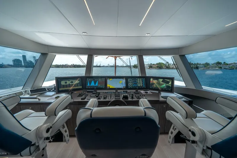 Slide: The Image of Luxurious 2020 Hargrave C92 yacht helm with advanced navigation systems and panoramic ocean view. - 37