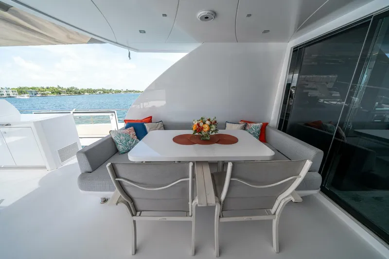 Slide: The Image of Luxurious 2020 Hargrave C92 yacht deck with elegant dining area and ocean view. - 41