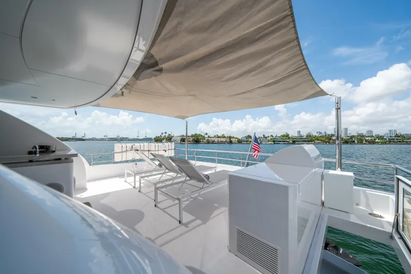 Slide: The Image of Luxurious 2020 Hargrave C92 yacht deck with sun loungers and ocean view. - 42