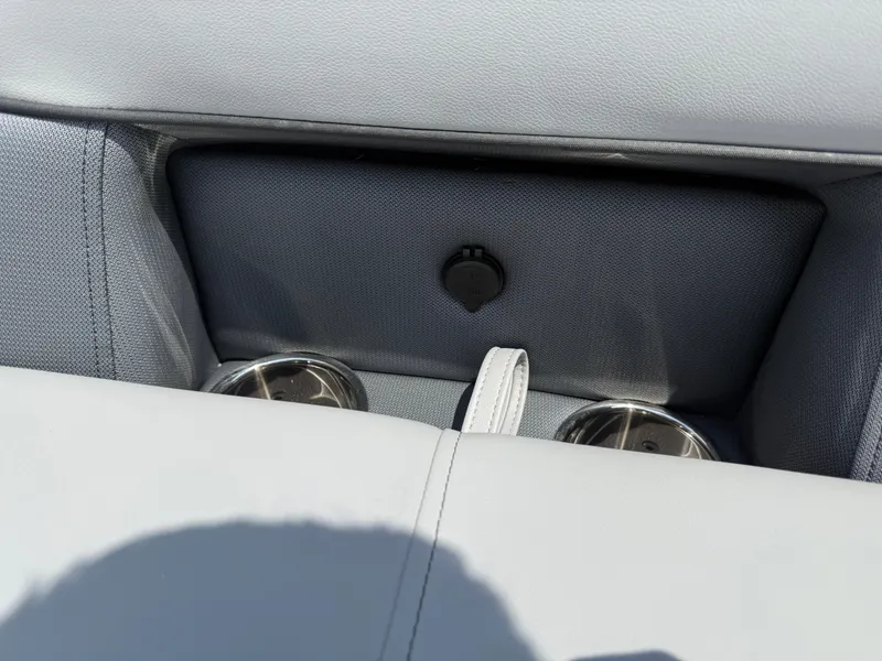 Slide: The Image of Interior of 2026 Bentley Pontoons Legacy 200 Navigator with cup holders and USB port. - 12