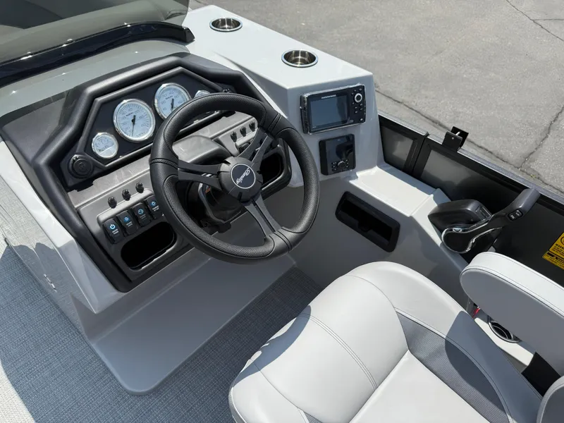 Slide: The Image of 2026 Bentley Pontoons Legacy 200 Navigator dashboard with steering wheel and controls. - 17