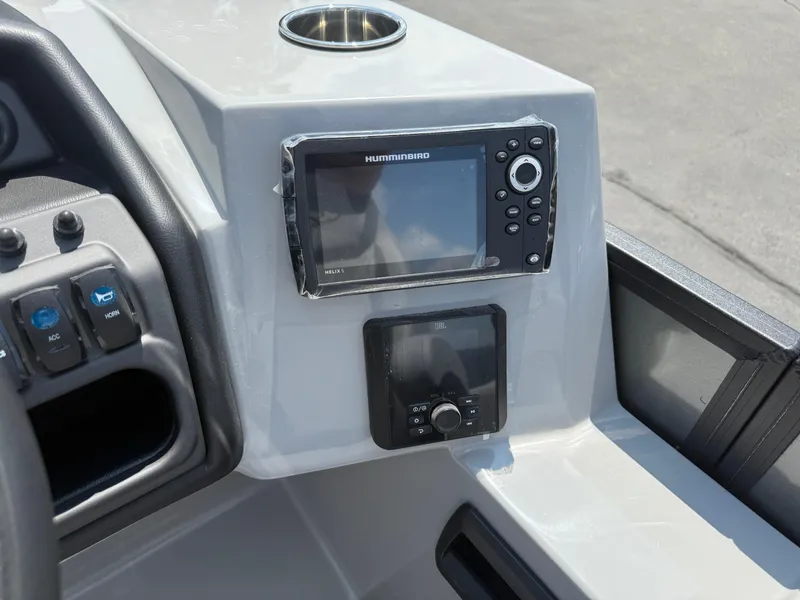 Slide: The Image of Control panel of 2026 Bentley Pontoons Legacy 200 Navigator with Humminbird display. - 19