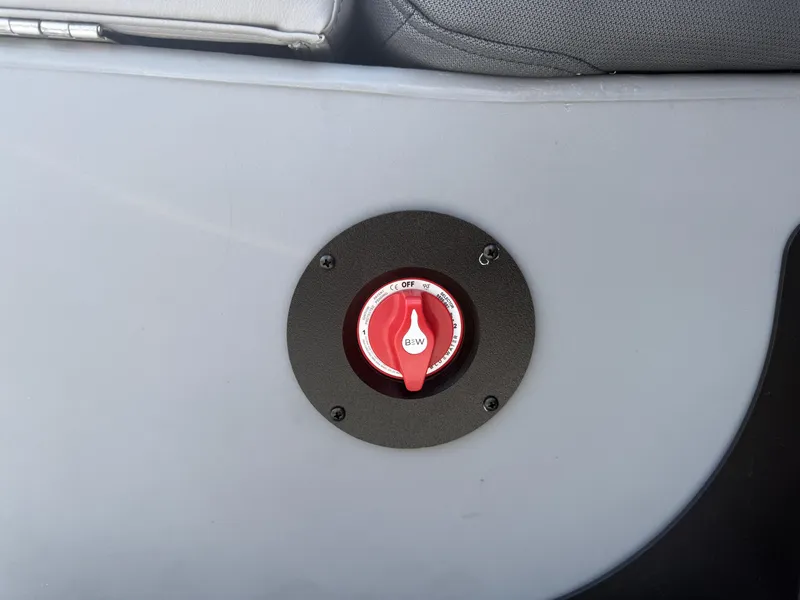 Slide: The Image of Red switch on 2026 Bentley Pontoons Legacy 200 Navigator boat panel. - 23