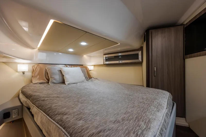 Slide: The Image of Luxurious bedroom interior of 2022 Regal 36 Grande Coupe yacht. - 38