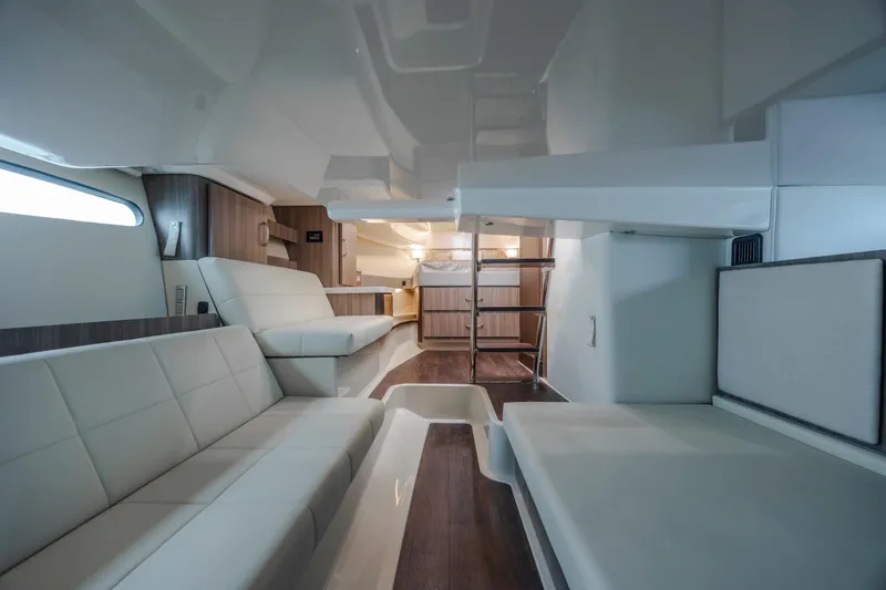 Slide: The Image of Interior of 2022 Regal 36 Grande Coupe yacht with modern seating and sleek design. - 42