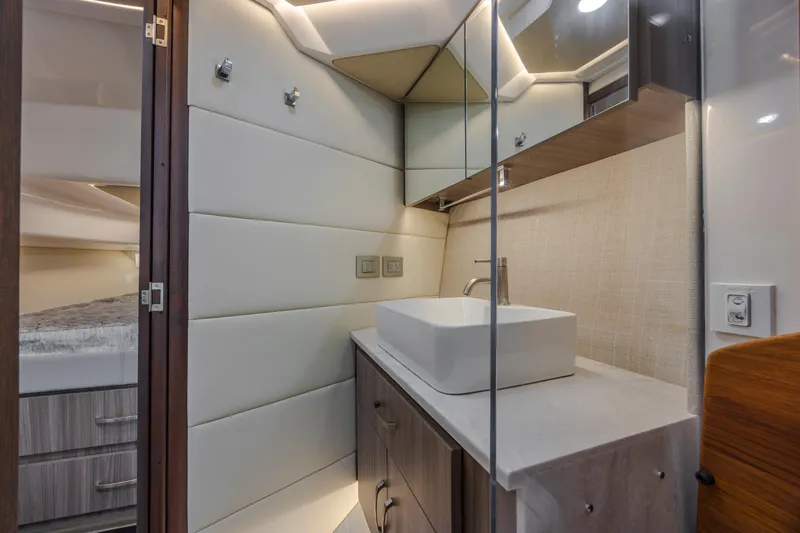 Slide: The Image of Modern bathroom interior of 2022 Regal 36 Grande Coupe yacht, featuring sleek design and fixtures. - 47