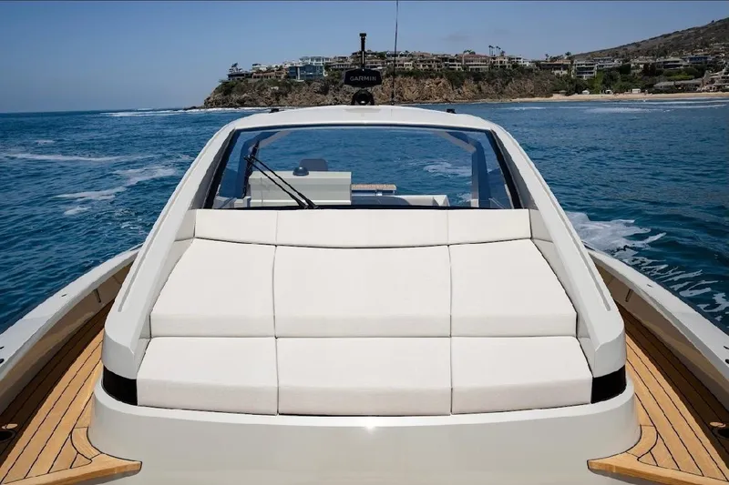 Slide: The Image of 2025 Maori 54ft XL yacht cruising on open water, featuring sleek design and luxurious seating. - 10