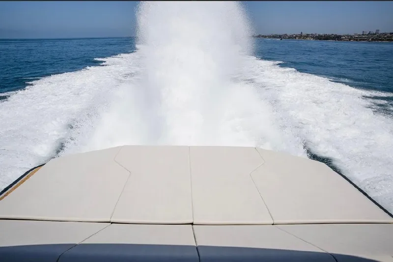 Slide: The Image of 2025 Maori 54ft XL yacht cruising, leaving a foamy wake in the ocean. - 25