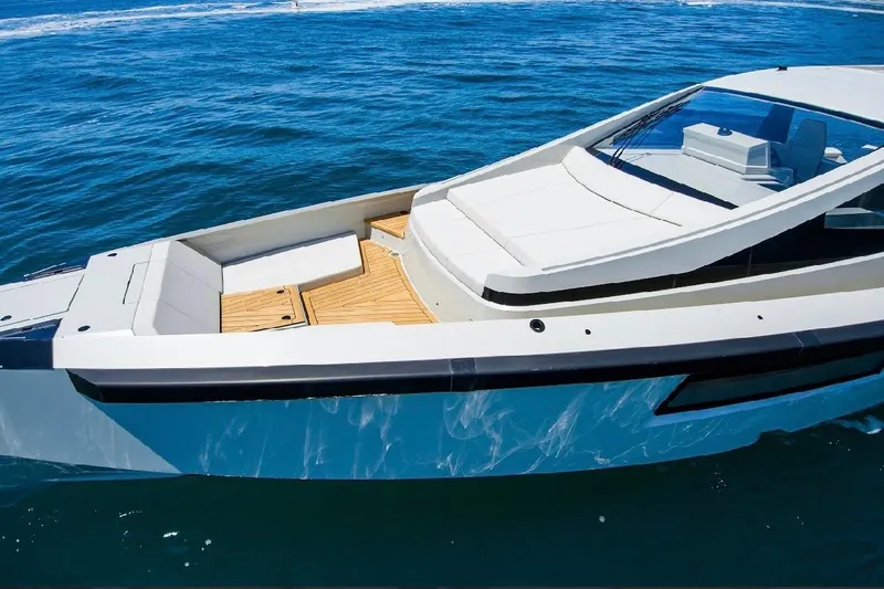 Slide: The Image of Luxury Maori 54ft XL yacht, 2025 model, cruising on open sea with sleek design. - 3