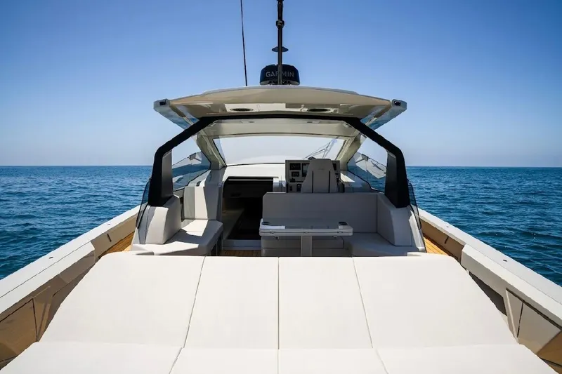 Slide: The Image of Luxurious 2025 Maori 54ft XL yacht on open sea, featuring sleek design and spacious deck. - 4