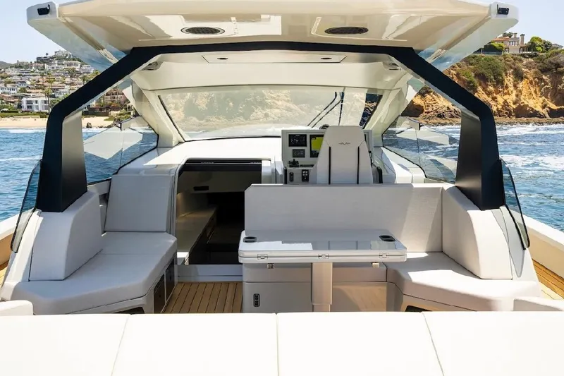 Slide: The Image of 2025 Maori 54ft XL yacht interior with modern seating and ocean view. - 6