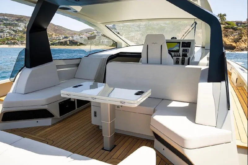 Slide: The Image of Luxurious 2025 Maori 54ft XL yacht interior with sleek seating and modern controls. - 7