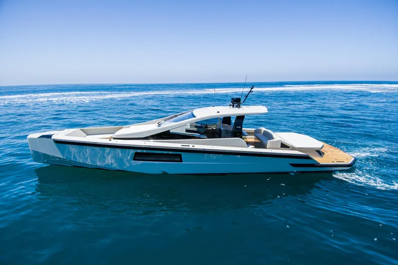 Slide: The Image of 2025 Maori 54ft XL yacht cruising on open blue sea. - 9