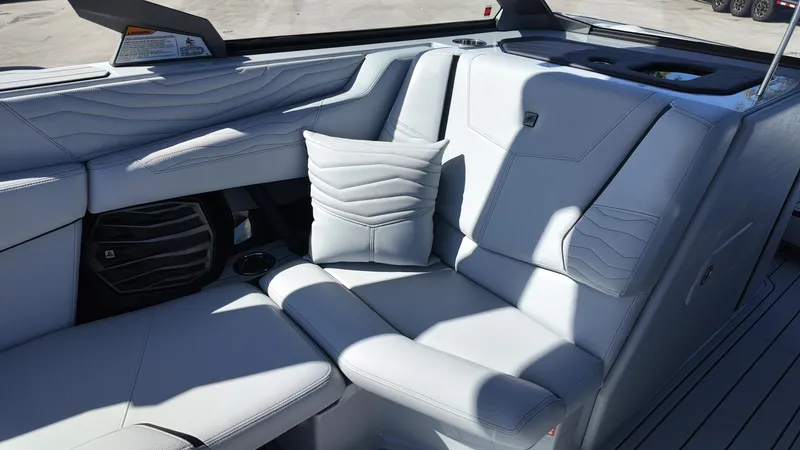 Slide: The Image of 2026 Nautique Paragon G23 interior with luxurious seating and modern design. - 14