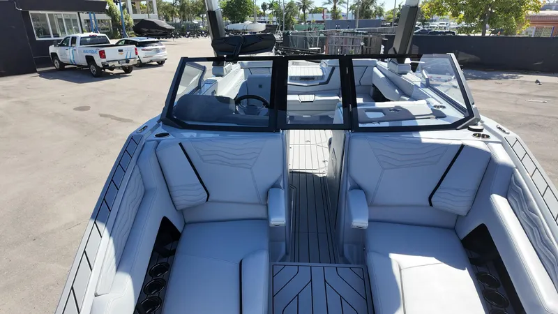 Slide: The Image of 2026 Nautique Paragon G23 boat interior with luxurious seating and modern design. - 15