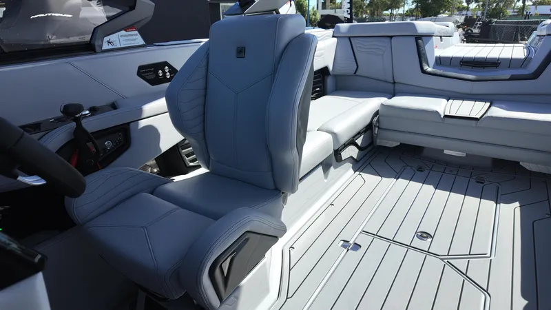 Slide: The Image of 2026 Nautique Paragon G23 interior with luxurious seating and modern design. - 19