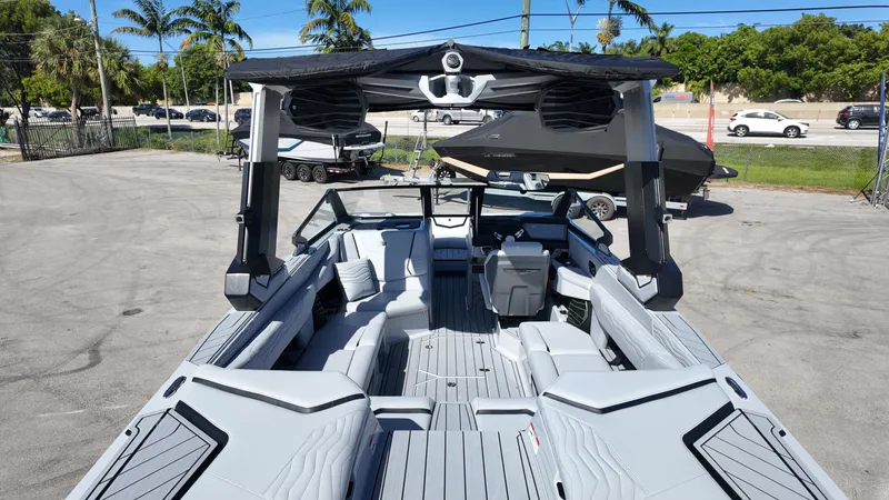 Slide: The Image of 2026 Nautique Paragon G23 boat with sleek interior design and advanced features. - 6