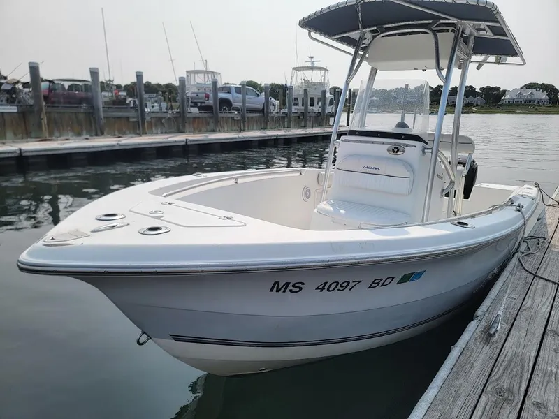 Slide: The Image of Laguna C210SC boat docked, 2007 model with 2018 G2 150 HP engine warranty. - 13
