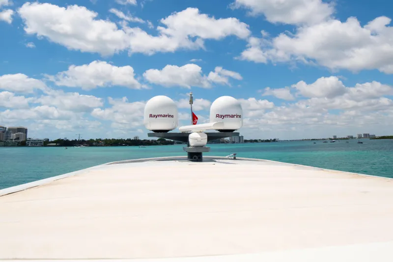 Slide: The Image of Bow view of 2018 Sirena 64 yacht with Raymarine radar domes on a sunny day. - 26