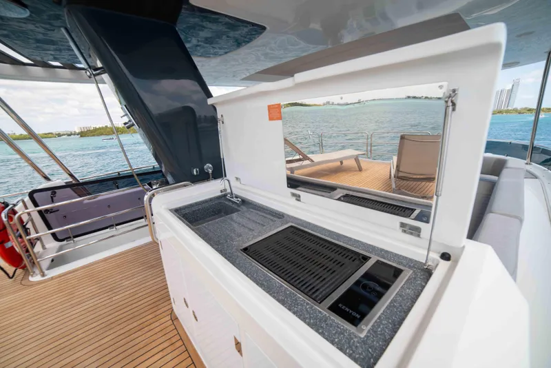 Slide: The Image of Outdoor kitchen on the 2018 Sirena 64 yacht with ocean view. - 28